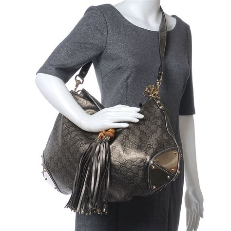 gucci metallic hobo bag|Gucci hobo bag with tassels.